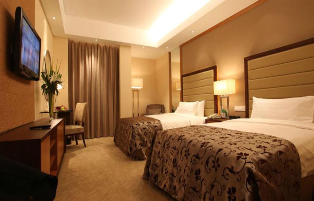 จอสเซียนเซสอินเตอร์เนชั่นแนลคอนเฟเรนซ์เซนเตอร์ Hotel ปักกิ่ง ห้อง รูปภาพ
